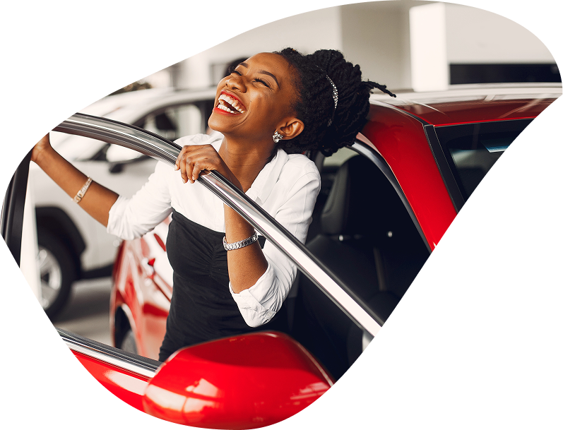 woman smiling in a car