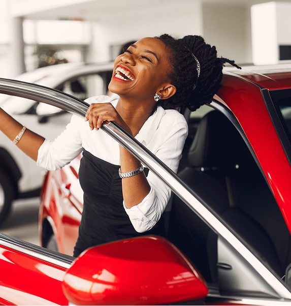 woman smiling in a car